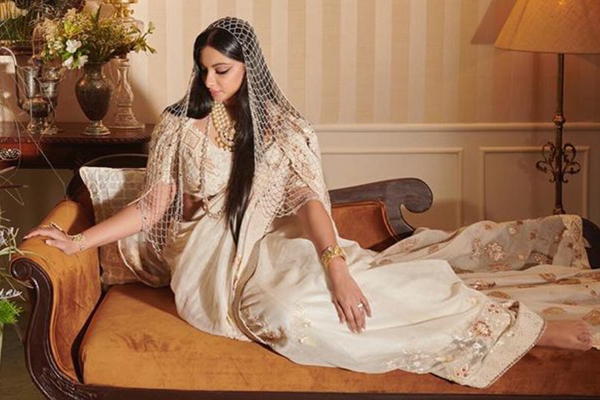 Ivroy saree, regal look, pearl encrusted veil