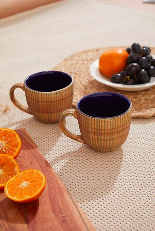blue and brown mugs