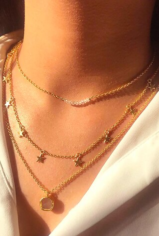 layered dainty necklace and chains