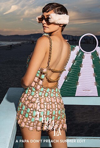 Bralette and skirt set embellished with glass cut beads, gold plated metal ghungroos (small bells) and attached with ring and chains.