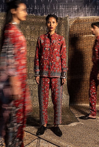 Printed long sleeve shirt with border down the side. Matching straight-cut pants.