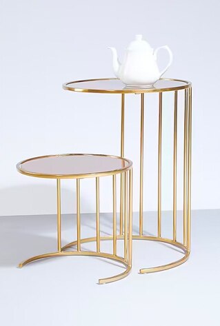 Brown and gold accent tables.