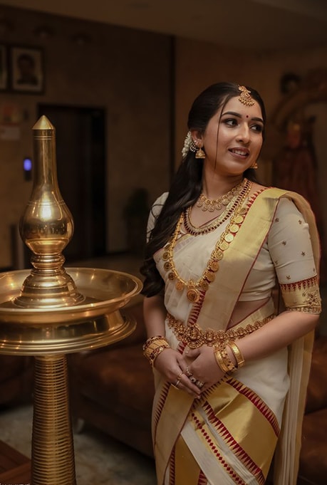 Mundum neriyathum saree draping