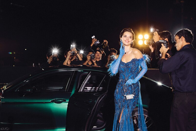 Gown :  Dolly J.
  Earings by Aster -  White Finish Zircon & Blue Stone Stud Earrings
  Neckpiece by Diosa -  White Necklace In Sterling Silver 
  Bag by Outhouse -  Multi-Colored Embellished Bag