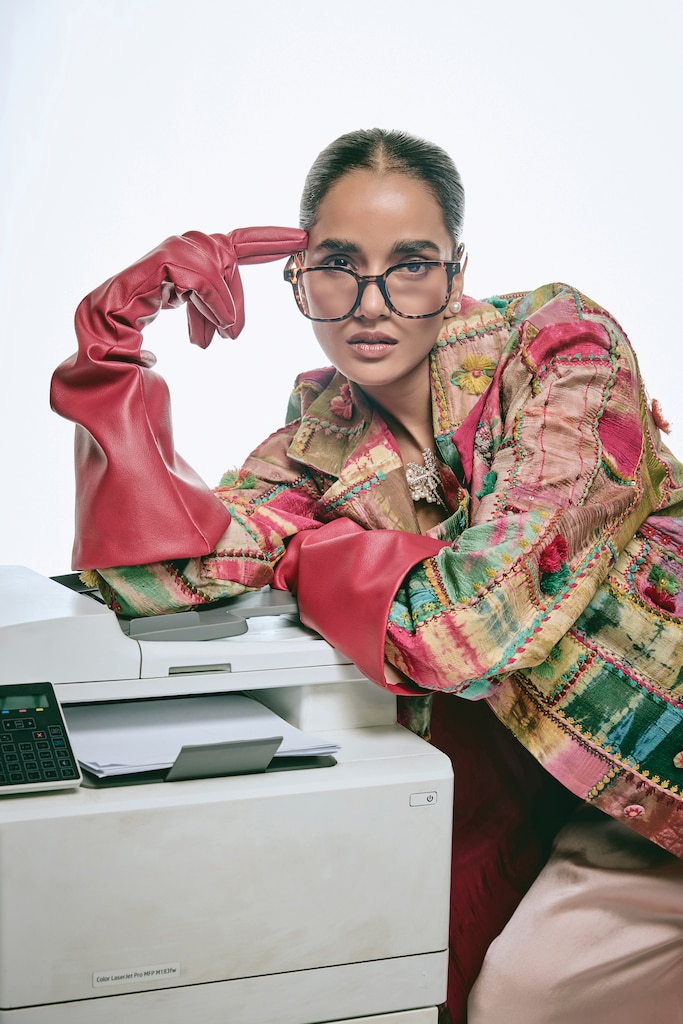 On Shalini: Capisvirleo (coat), The Little Black Bow (trouser), Stella Creations (Jewellery).