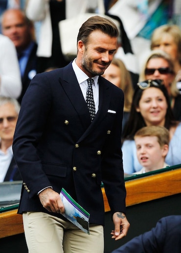 david becham in double breasted suit jacket