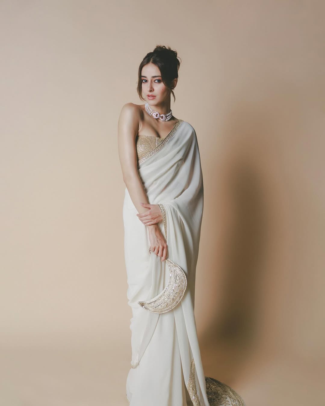 A classic ivory & gold combo by Masaba