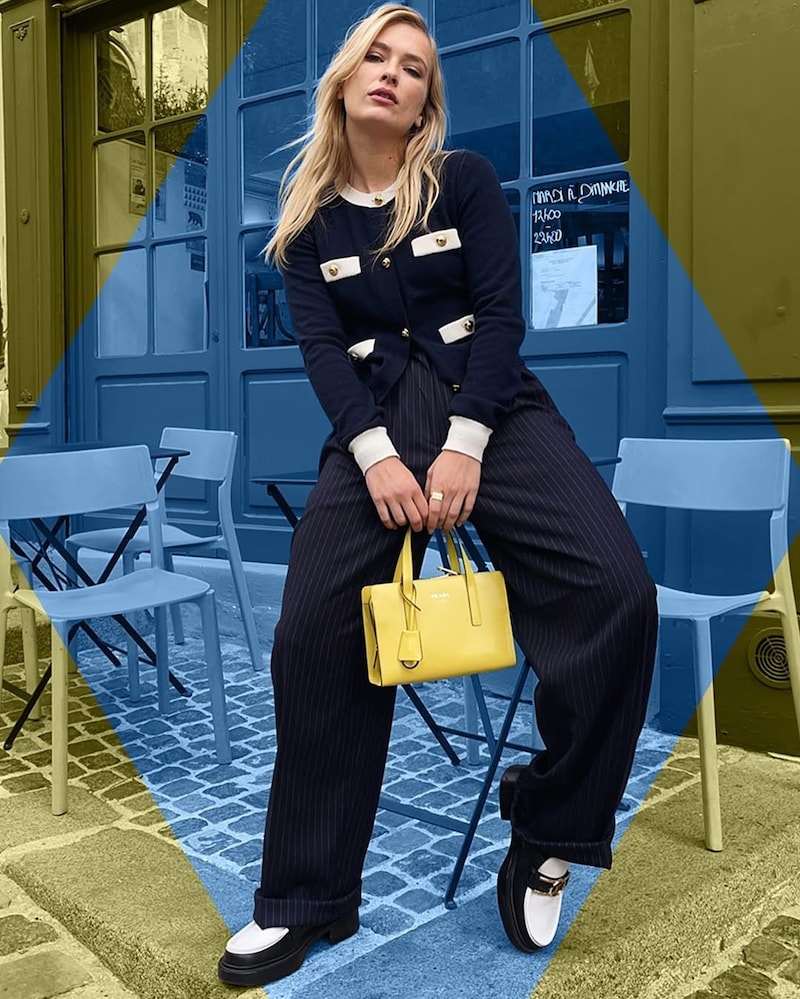 Camille in black suit