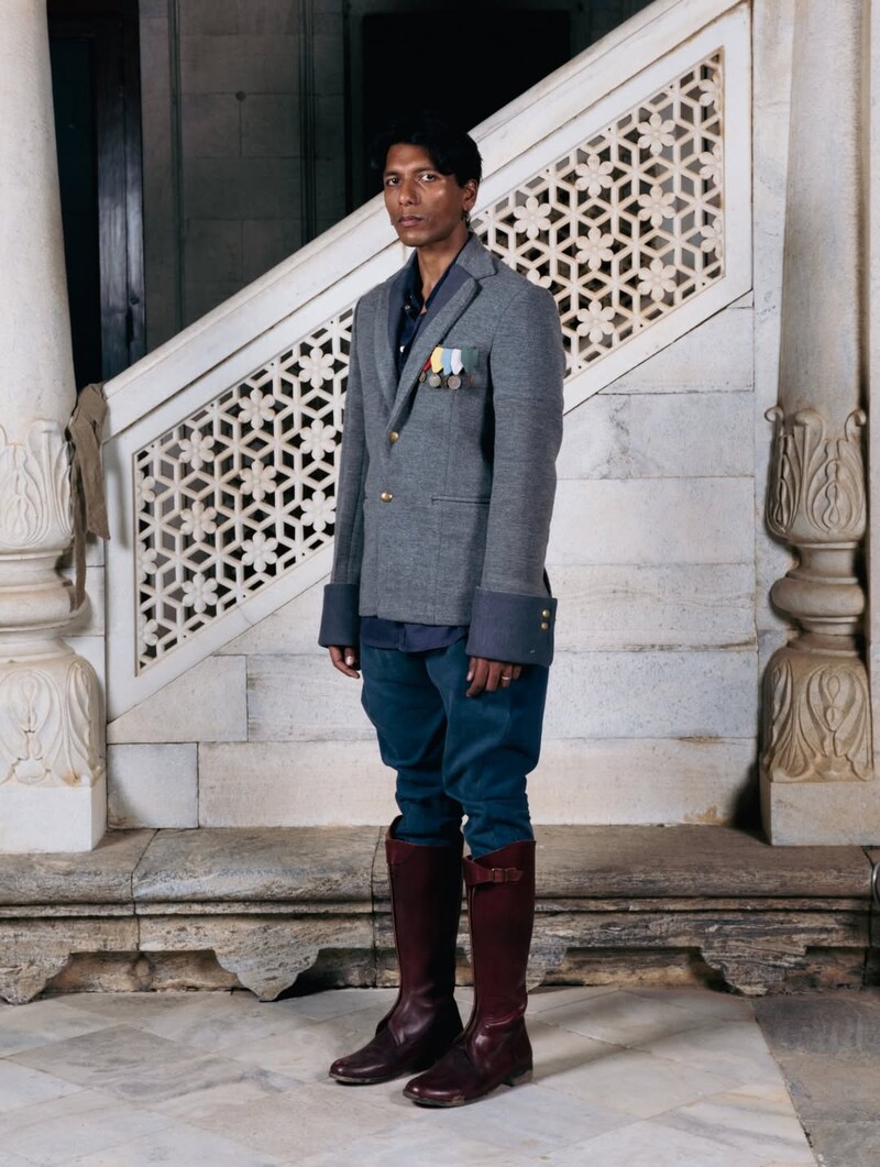 Model presenting the bold first ensemble that set the visual tone for the collection